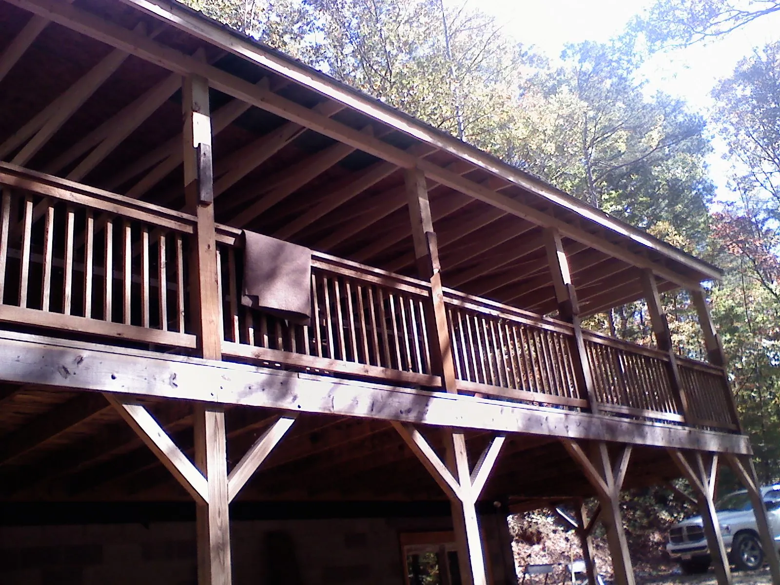 Timber framing under a new elevated porch and deck — Roof Leak Repair in Washoe Valley by Roofing Brothers